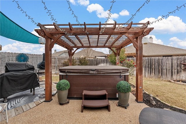 view of patio / terrace with a pergola, grilling area, and a hot tub