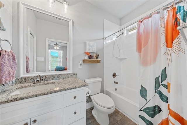 full bathroom featuring shower / bath combination with curtain, vanity, a healthy amount of sunlight, and hardwood / wood-style flooring