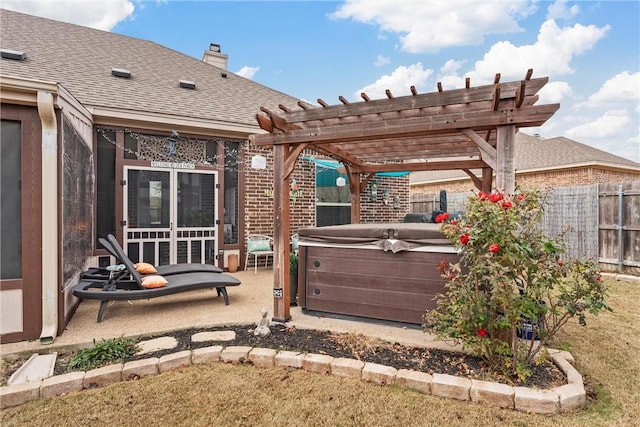 view of patio / terrace featuring a pergola and a hot tub