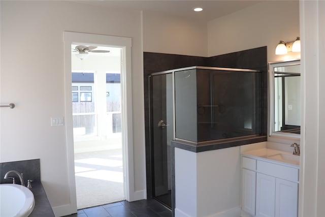 bathroom featuring tile patterned flooring, vanity, separate shower and tub, and ceiling fan