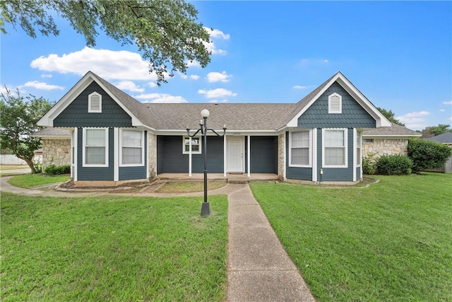 view of front facade with a front yard