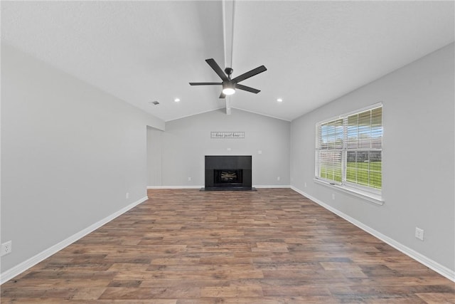 unfurnished living room featuring vaulted ceiling with beams, ceiling fan, and wood-type flooring