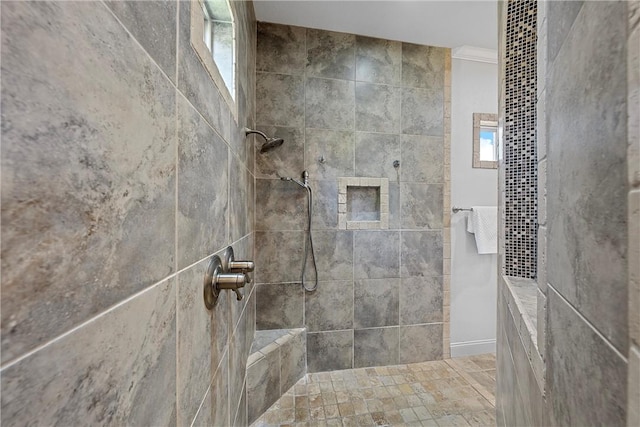 bathroom featuring tiled shower