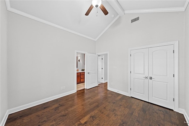 unfurnished bedroom with ceiling fan, high vaulted ceiling, dark hardwood / wood-style flooring, a closet, and beamed ceiling