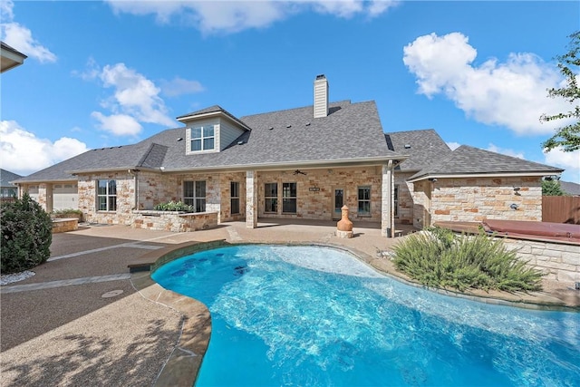 view of pool with a patio, ceiling fan, and a jacuzzi