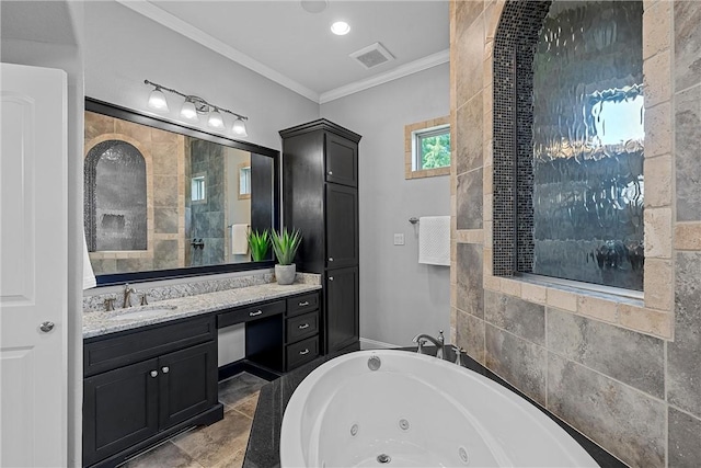 bathroom with crown molding, vanity, and tiled bath