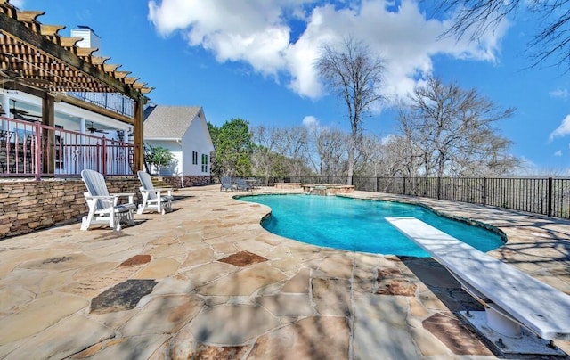 view of swimming pool featuring a pergola, a patio area, fence, and ceiling fan