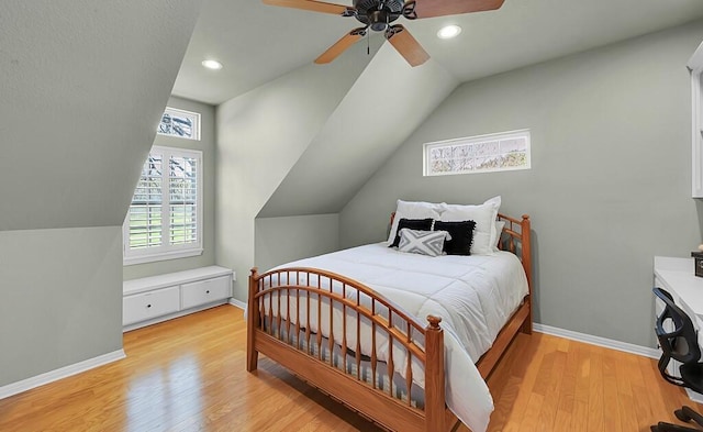 bedroom featuring vaulted ceiling, recessed lighting, baseboards, and light wood-type flooring