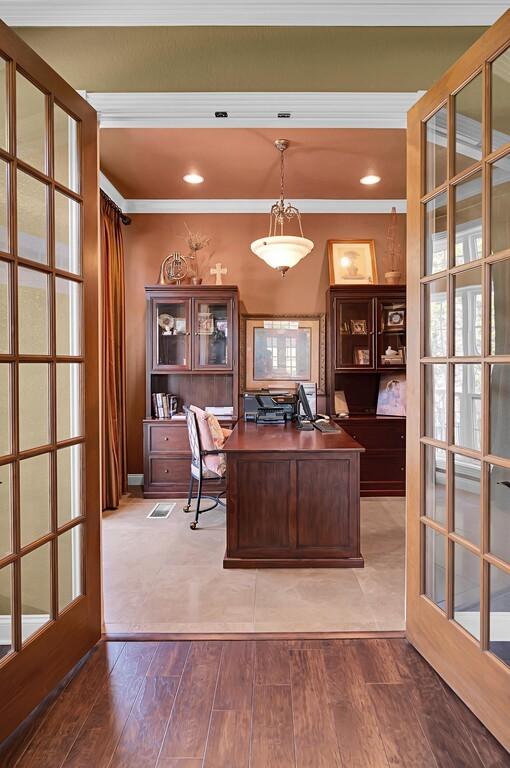 home office with recessed lighting and wood finished floors