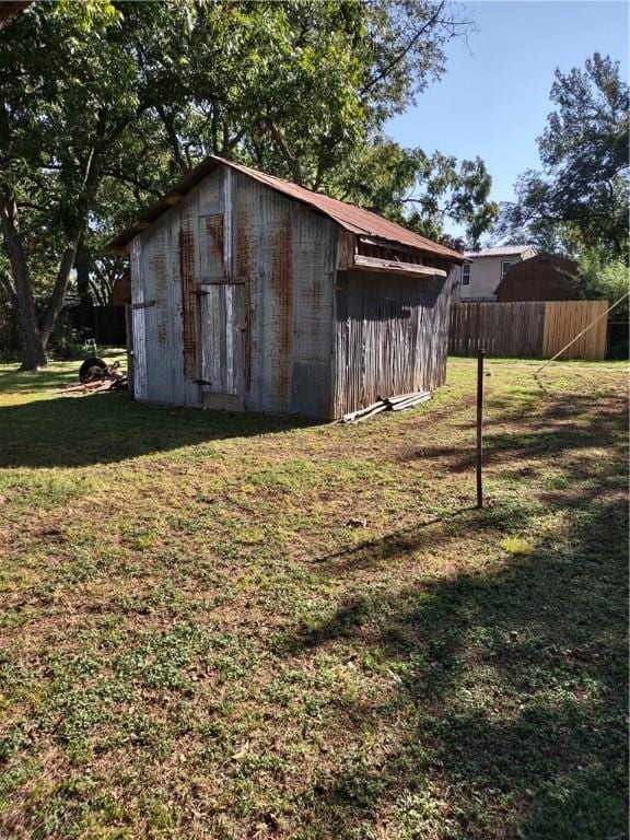 view of outdoor structure featuring a yard