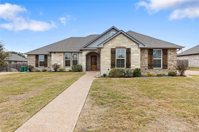 view of front of home with a front lawn