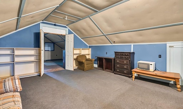 bonus room with carpet and lofted ceiling