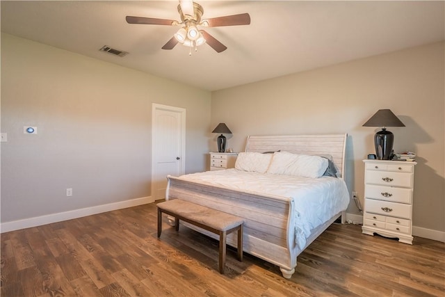 bedroom featuring ceiling fan and dark wood-type flooring