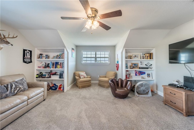 carpeted living room featuring ceiling fan