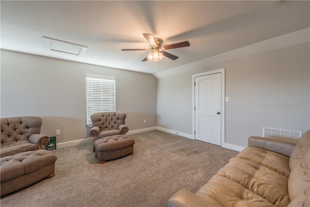 carpeted living room with vaulted ceiling and ceiling fan