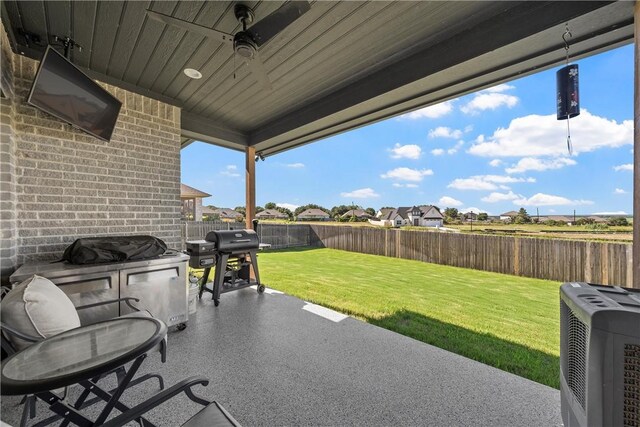 view of patio / terrace featuring a fenced backyard and grilling area