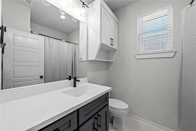 full bath with visible vents, baseboards, toilet, tile patterned floors, and vanity