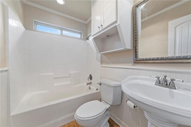 full bathroom with sink, crown molding, toilet, shower / bathing tub combination, and hardwood / wood-style flooring