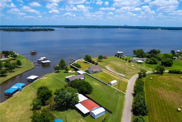 drone / aerial view with a water view