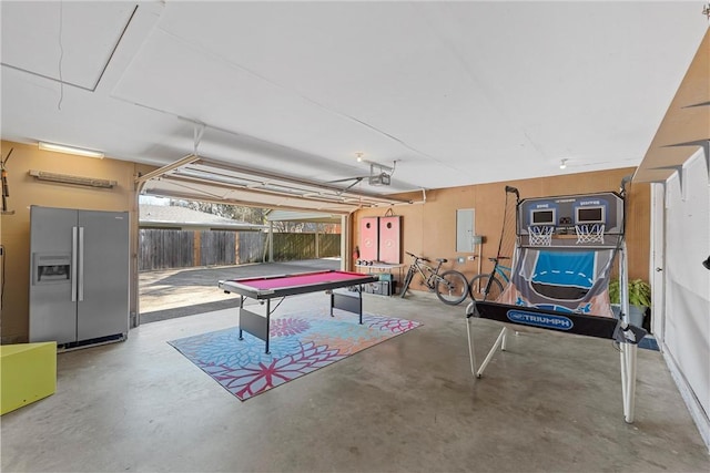 recreation room with concrete flooring, electric panel, and billiards