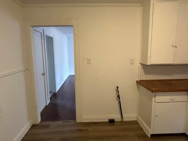 washroom with dark wood-type flooring