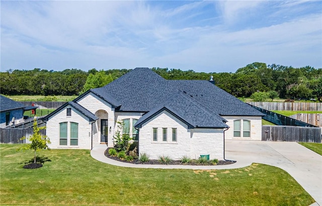 view of front of property with a front lawn