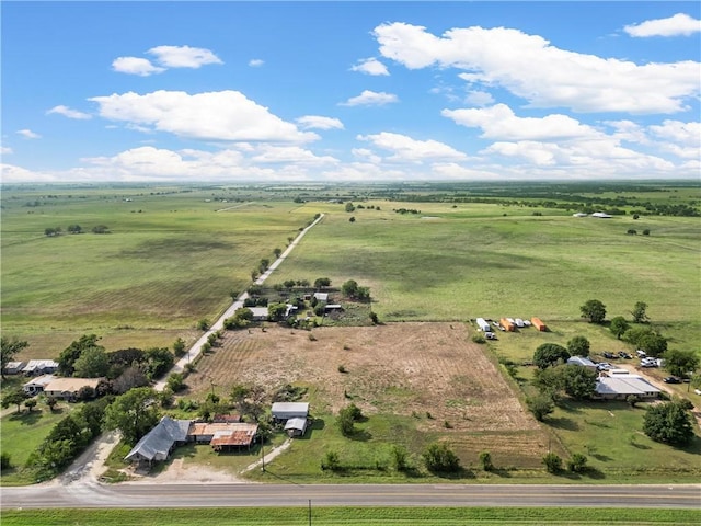 birds eye view of property featuring a rural view