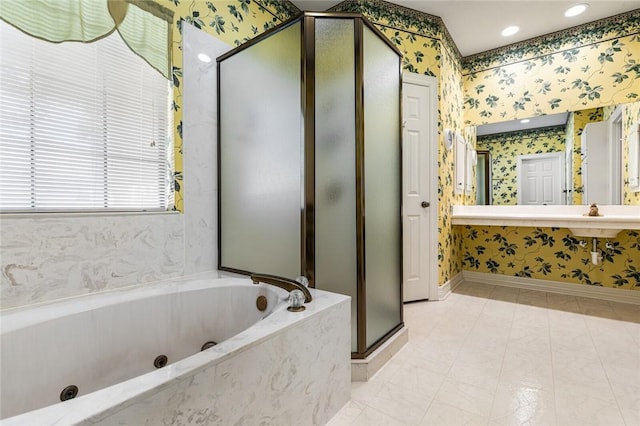 bathroom featuring separate shower and tub