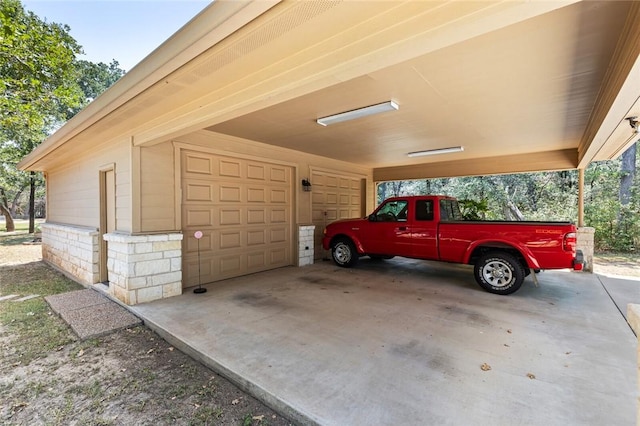 garage featuring a carport