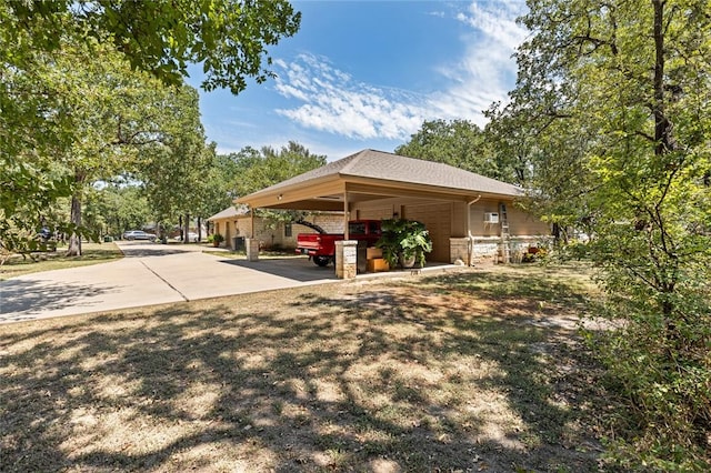 view of home's exterior with a carport