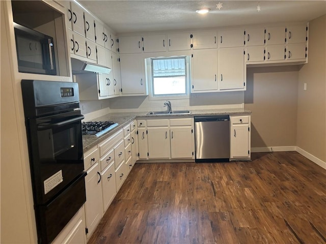 kitchen featuring sink, stainless steel appliances, and white cabinets