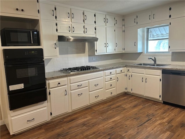 kitchen featuring dark wood-type flooring, white cabinets, sink, and black appliances