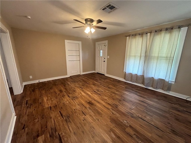 foyer featuring dark hardwood / wood-style floors and ceiling fan