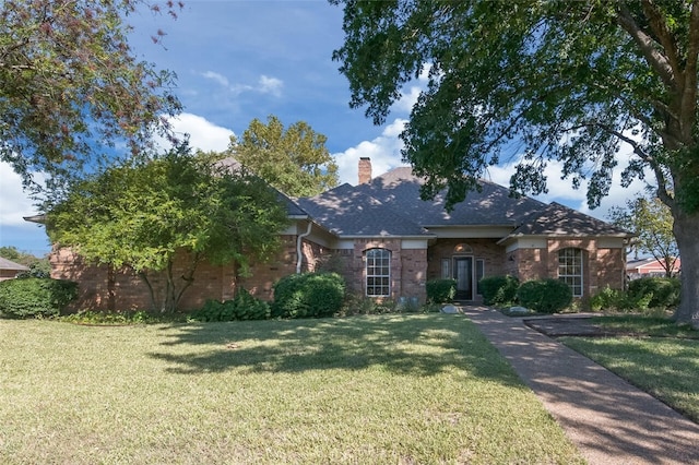 ranch-style house with a front lawn