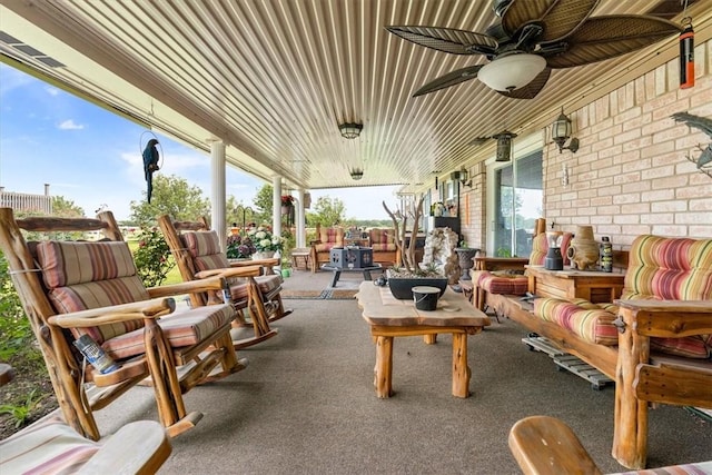 view of patio / terrace featuring ceiling fan