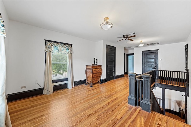 interior space featuring ceiling fan and hardwood / wood-style floors