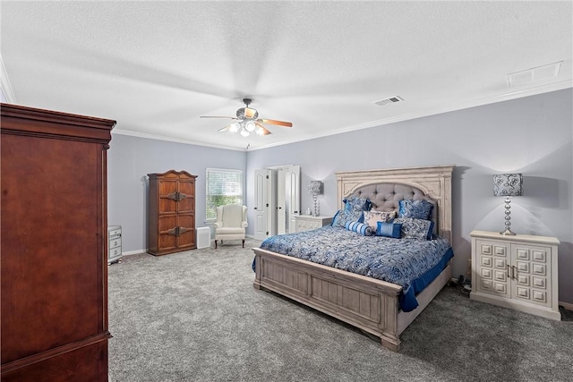 bedroom with carpet, ceiling fan, ornamental molding, and a textured ceiling