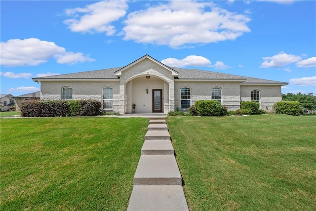 view of front of home with a front yard