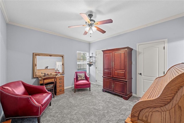 sitting room featuring ceiling fan, crown molding, and light carpet