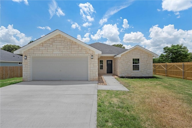 ranch-style house with a garage and a front lawn