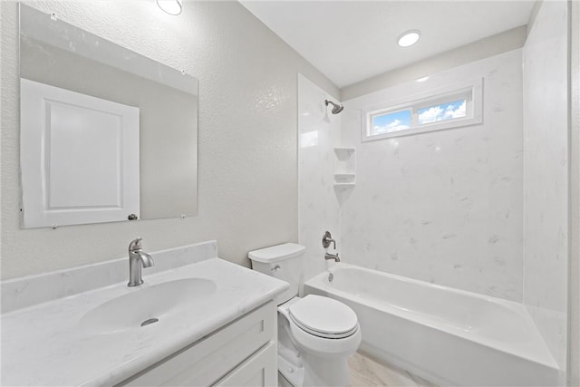 full bathroom featuring shower / tub combination, vanity, and toilet