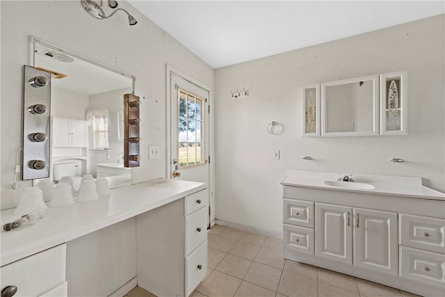 bathroom featuring vanity and tile patterned floors