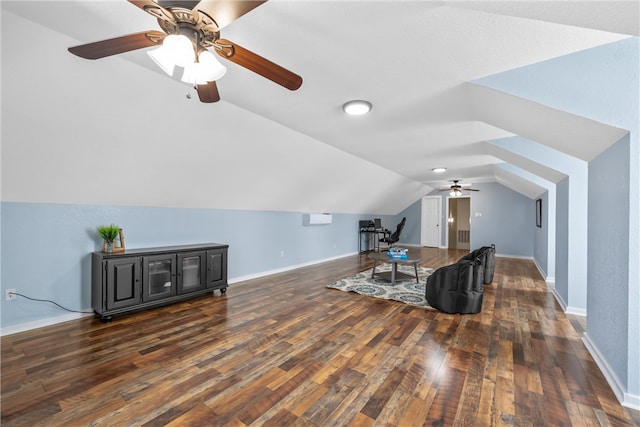 additional living space featuring baseboards, lofted ceiling, wood-type flooring, and ceiling fan