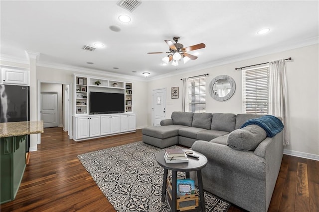 living area featuring visible vents, dark wood-type flooring, and ceiling fan