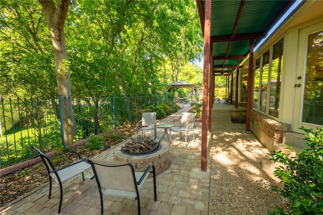 view of patio / terrace with a gazebo and an outdoor fire pit