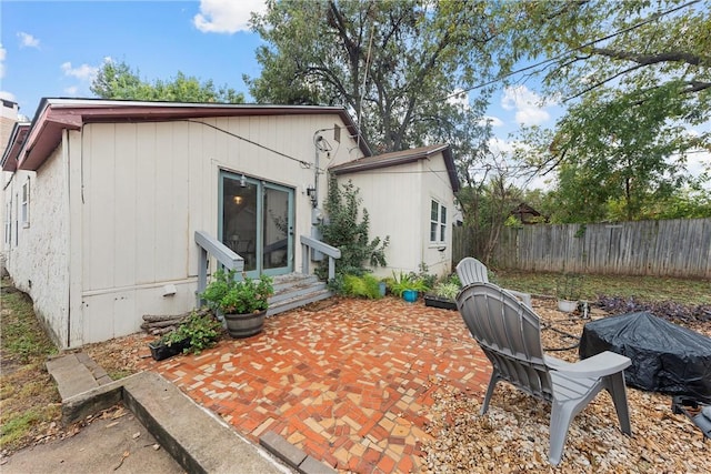 rear view of house with a patio