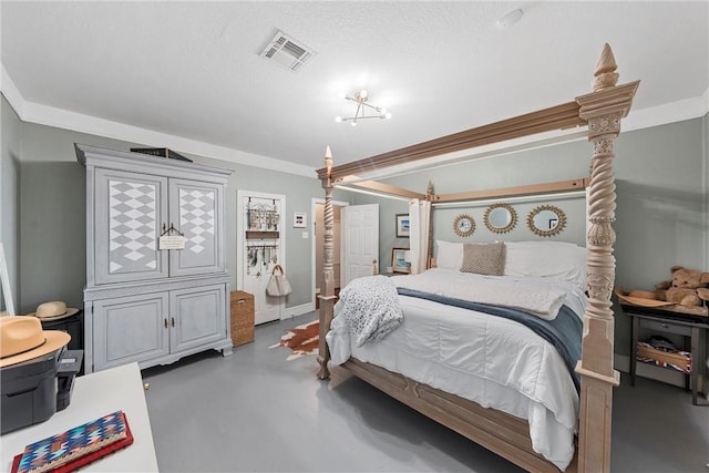 bedroom with a textured ceiling and ornamental molding