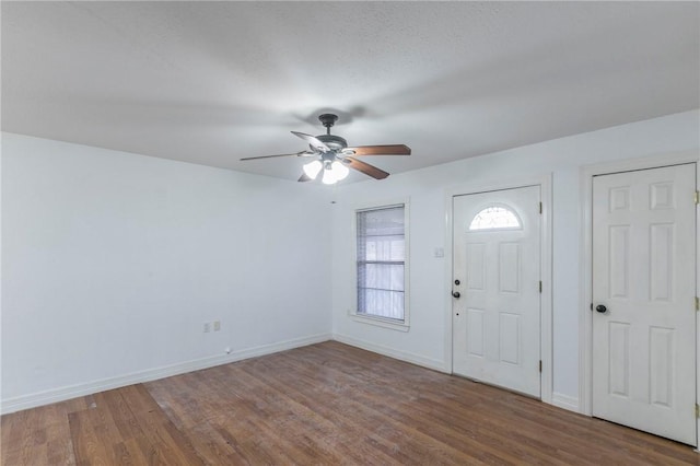 entryway featuring wood-type flooring and ceiling fan