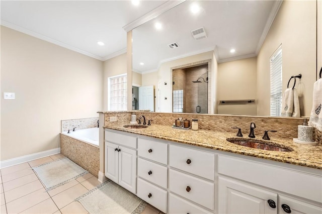 bathroom with vanity, tile patterned floors, crown molding, separate shower and tub, and tasteful backsplash