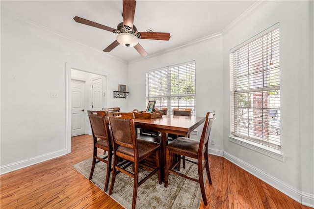 hallway with separate washer and dryer and light hardwood / wood-style floors